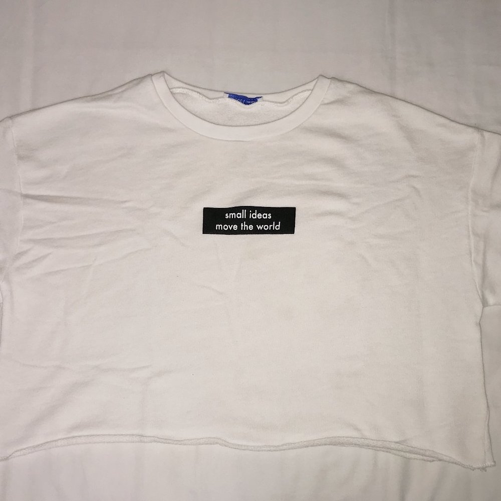 "small ideas move the world" Cropped Tee